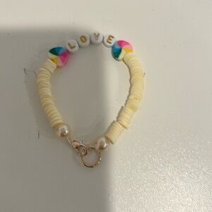 Cream colored, love bracelet